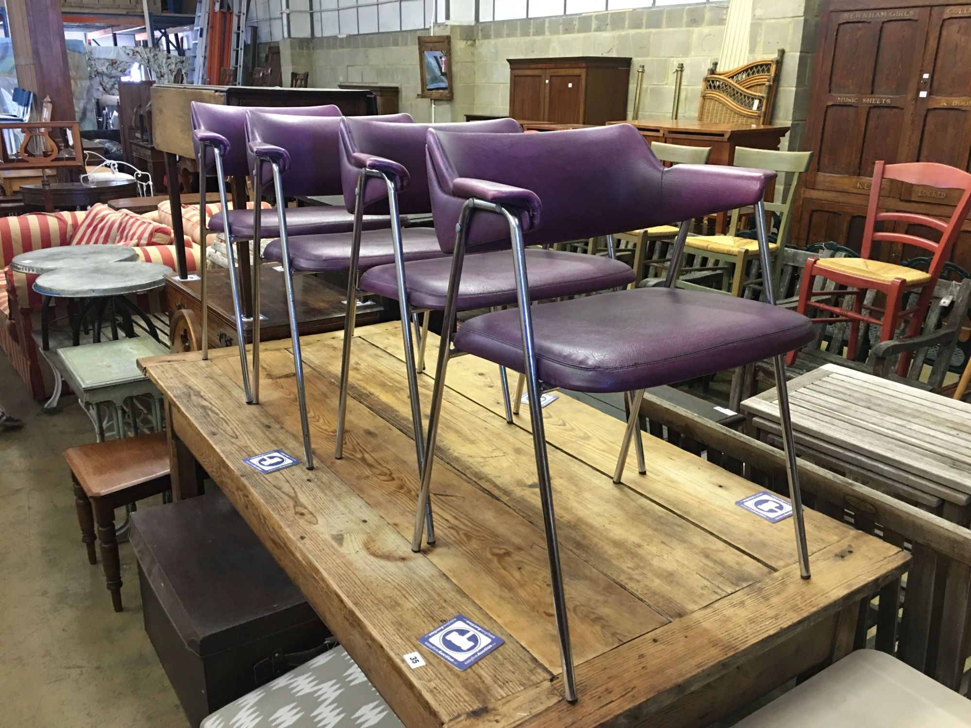 A set of four 1960s chrome framed Pel style elbow chairs